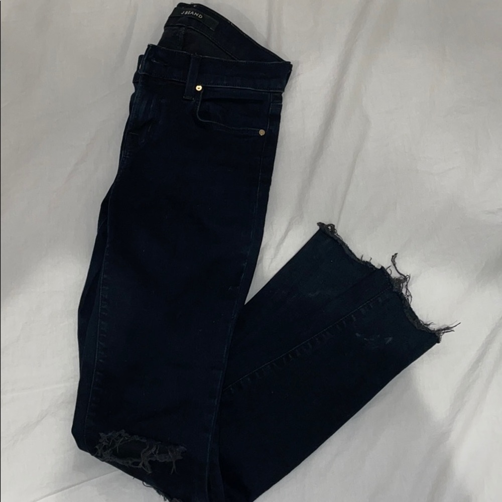 Lightly worn dark navy jeans
